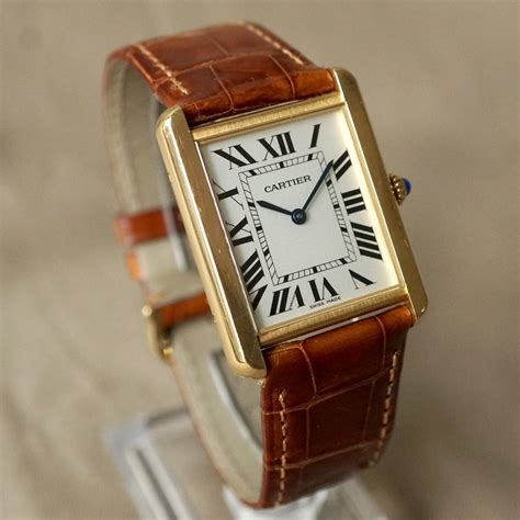 cartier tank solo large gold.